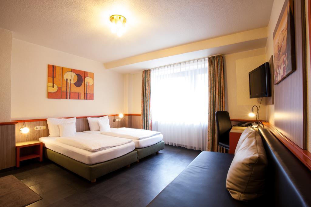 Trip Inn Hotel Ariane Köln Rum bild